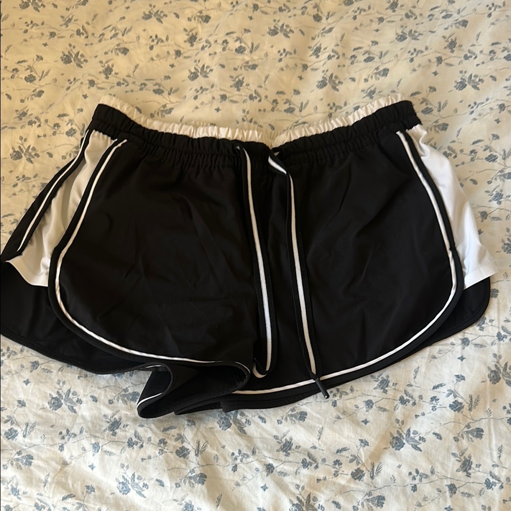 Athleta Black and White Athletic Shorts with Dolphin Hem